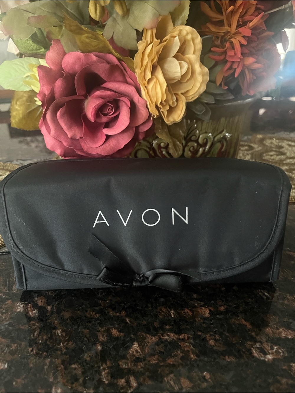 Avon Black Foldable Cosmetic Case with Bow Accent